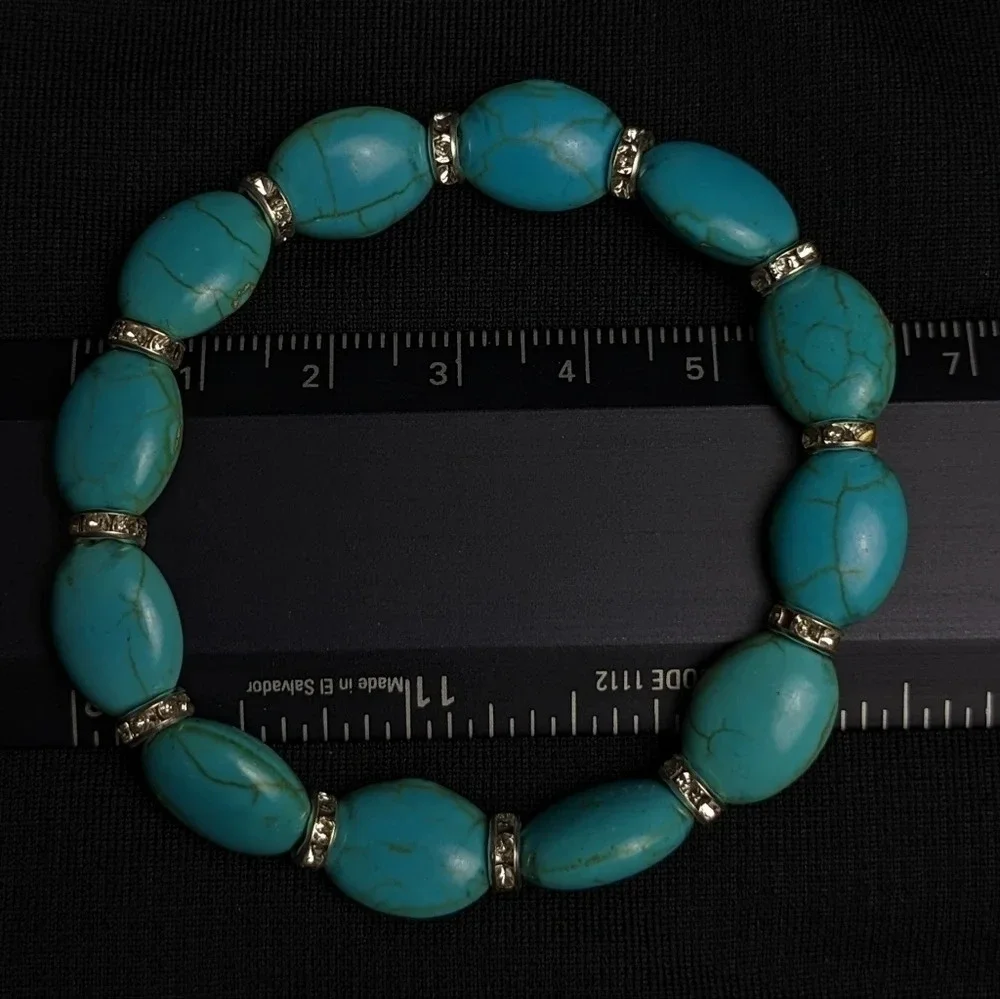 Pretty faux turquoise color beaded bracelet with CZ, oblong shape beads